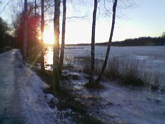 Sun low over Vartiokylänlahti