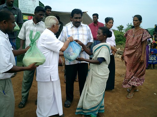 Dr. A.T. Ariyaratne Handing Out Dry Rations
